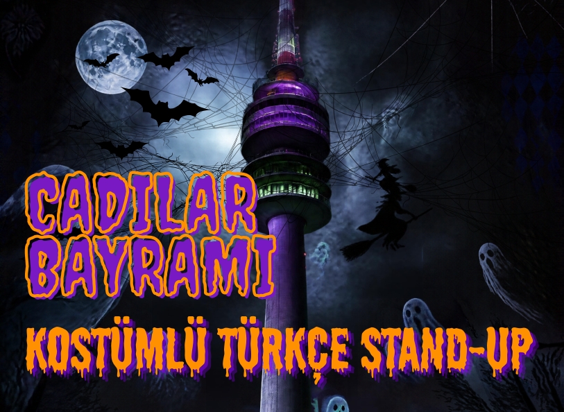 Münih Cadılar Bayramı kostümlü Türkçe stand-up afişi: Olympiaturm, cadılar ve yarasalar